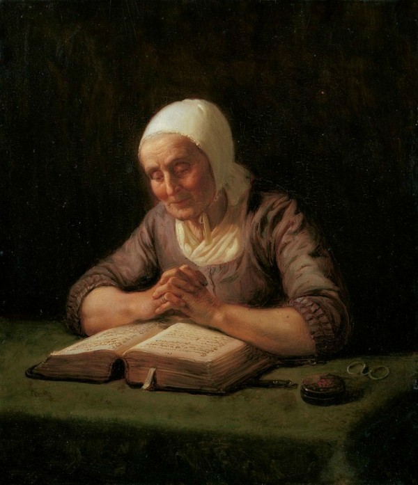 An old lady reading Print
